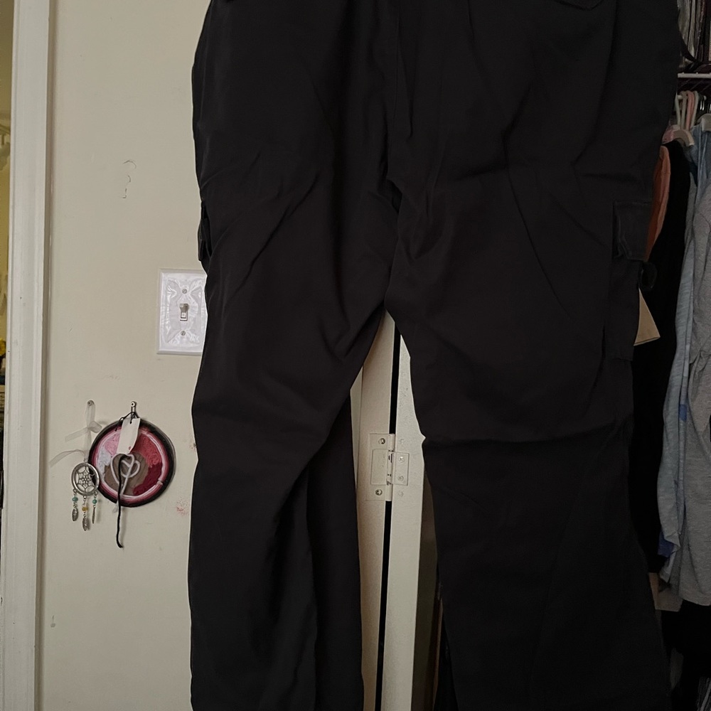 Dickies brand cargo pants. Color black. Size 24. Never worn brand new! No tags.